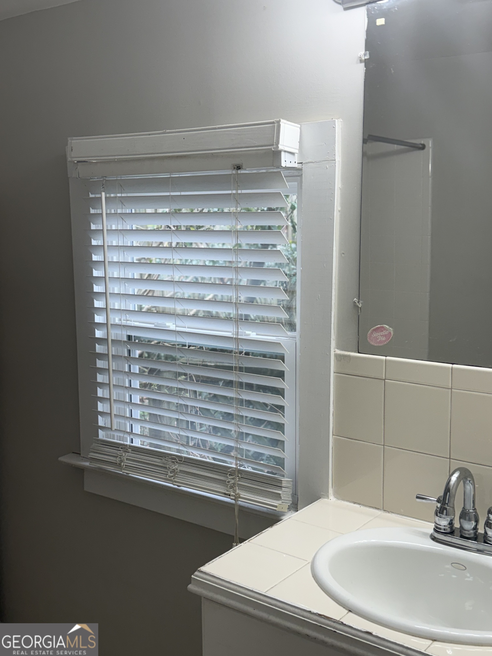 1750 Linwood Avenue East Point, GA 30344 - Photo 17 of 27 a bathroom with a sink a toilet and shower