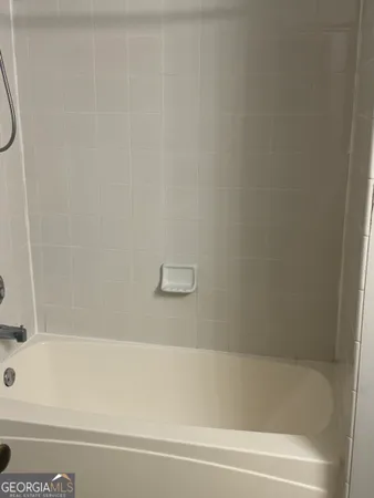 a bathroom with a bathtub