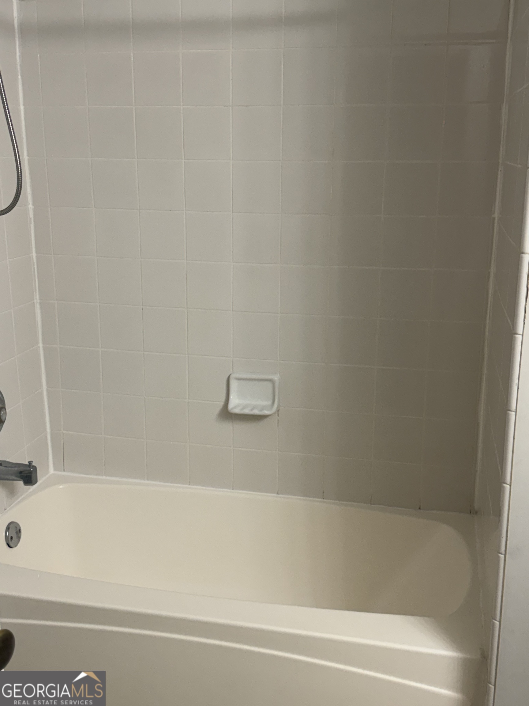 1750 Linwood Avenue East Point, GA 30344 - Photo 19 of 27 a bathroom with a bathtub