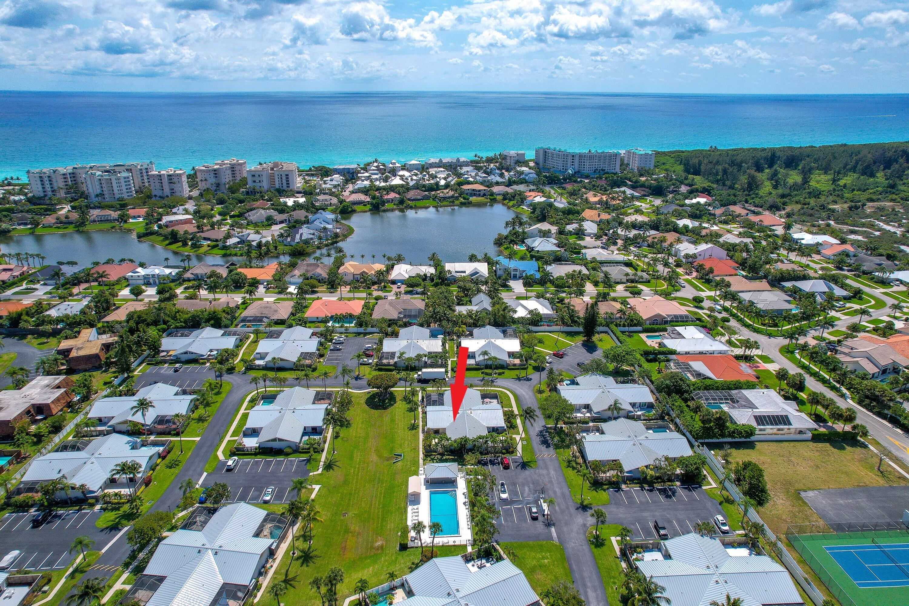 1801 Us Highway, Unit 18D Jupiter, FL 33477 - Photo 33 of 36 an aerial view of residential houses with outdoor space