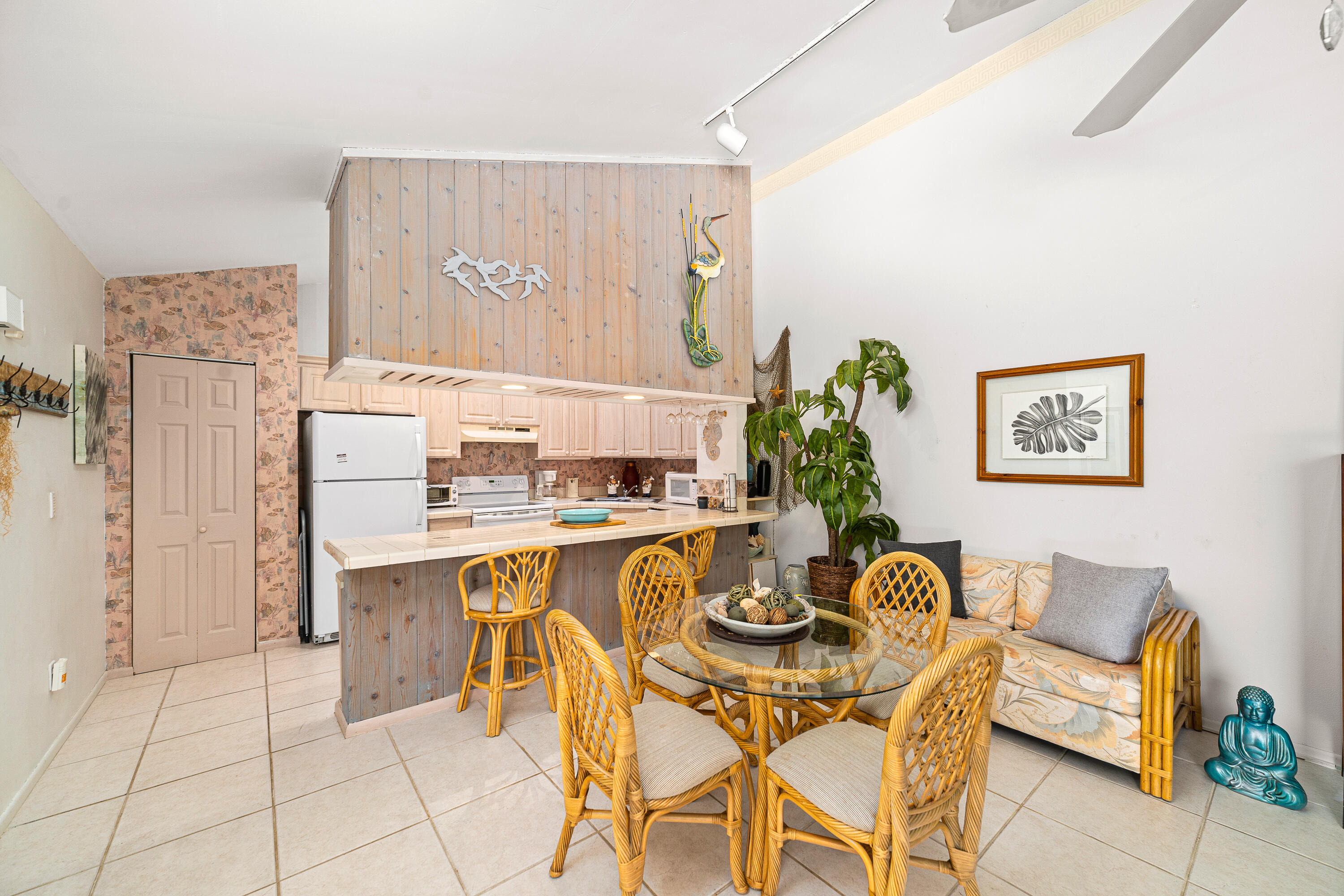 1801 Us Highway, Unit 18D Jupiter, FL 33477 - Photo 5 of 36 a view of a dining room with furniture