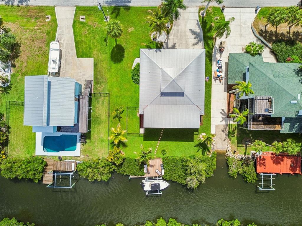 119 Burns Road Terra Ceia, FL 34250 - Photo 98 of 100 an aerial view of a house with an outdoor space and seating
