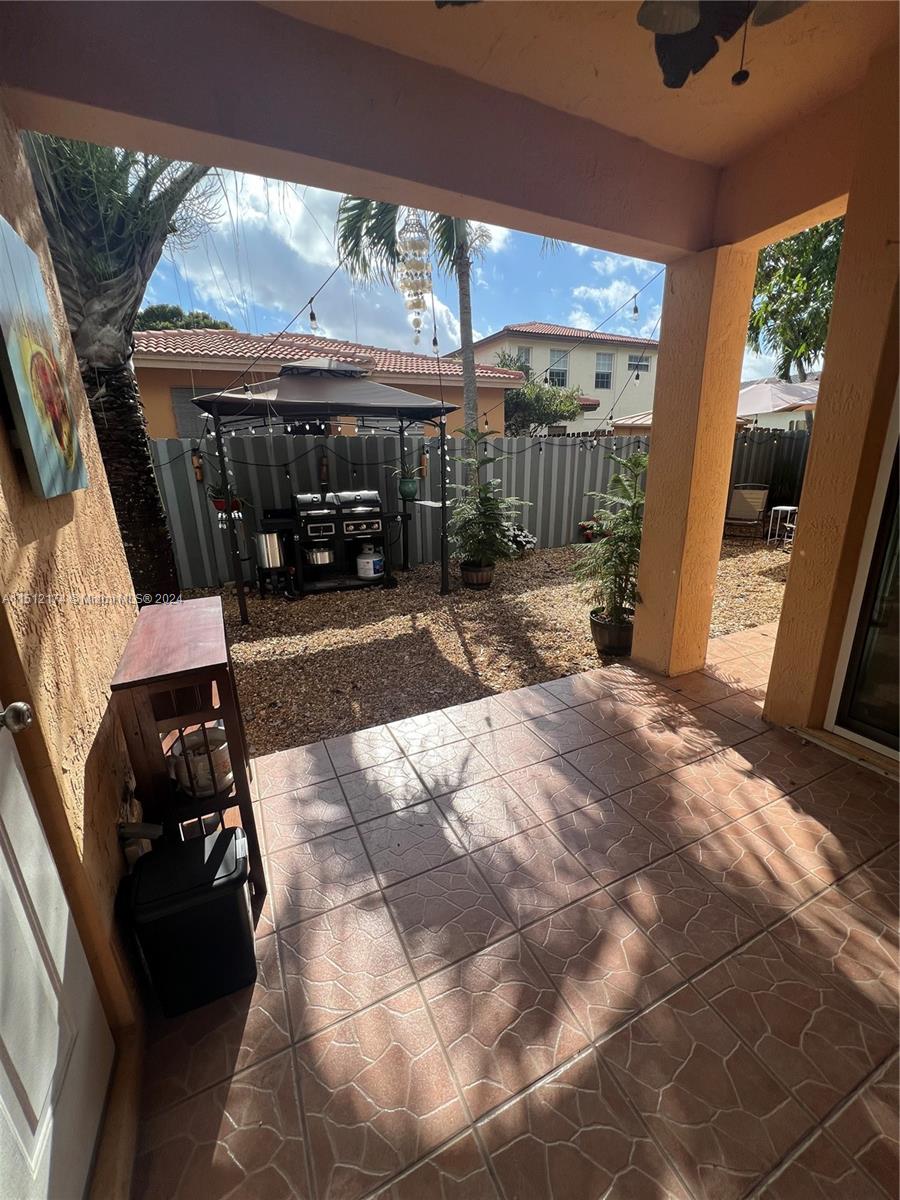 8118 Northwest 200th Street Hialeah, FL 33015 - Photo 21 of 24 a view of a porch with furniture