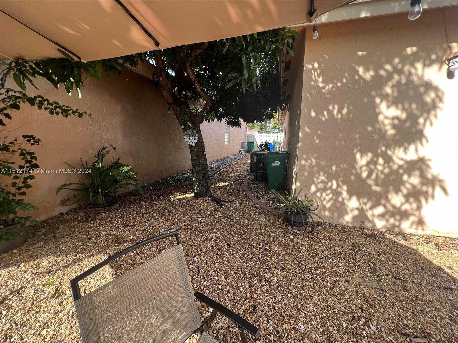 8118 Northwest 200th Street Hialeah, FL 33015 - Photo 23 of 24 a view of a backyard