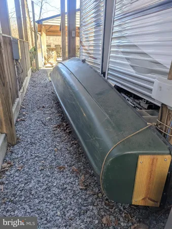 a view of living room kitchen outdoor space and wooden floor