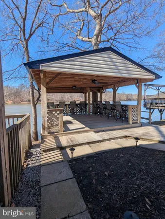 a view of a patio with wooden floor