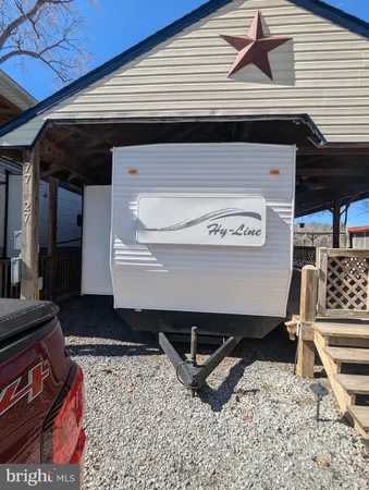 a room with a stove and a table
