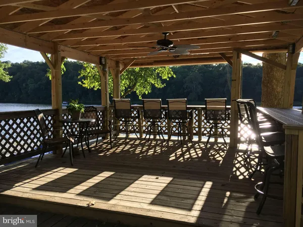 a view of a car park in front of house