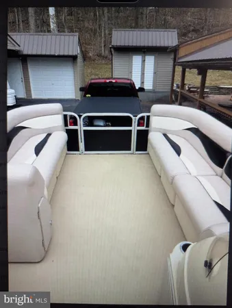 a front view of a house with parking space