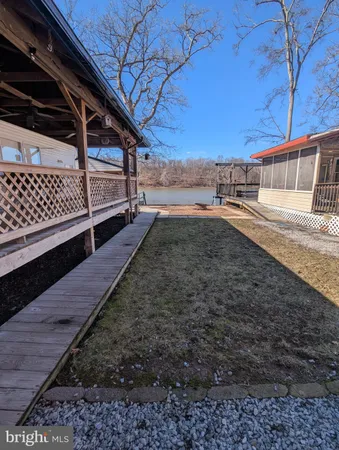 a view of a backyard of the house