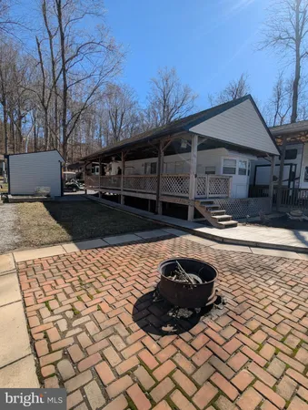 a view of a backyard of the house