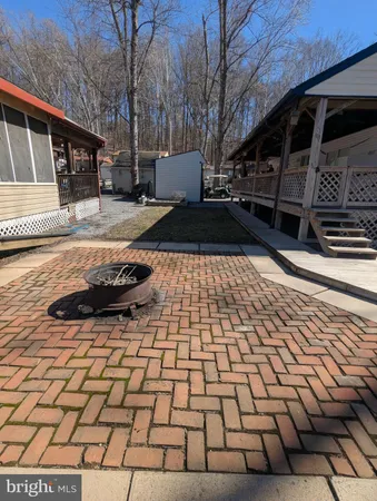 a view of a backyard of the house