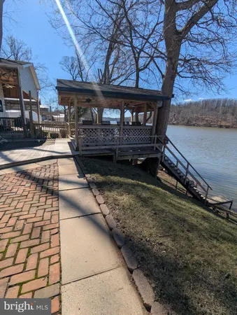 a view of a backyard of a house