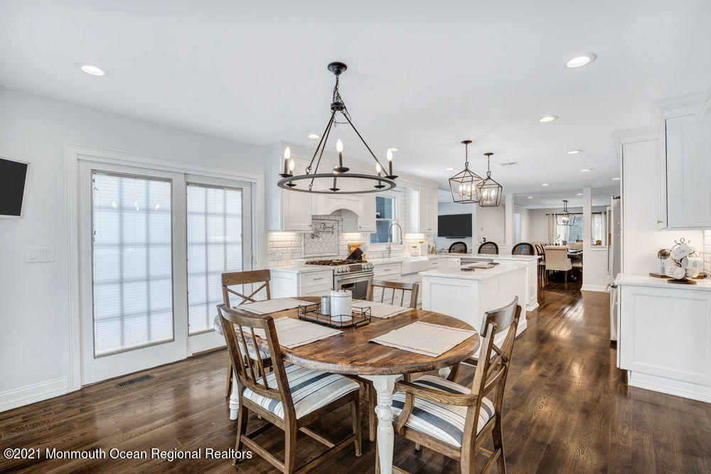 5 Cedar Drive Colts Neck, NJ 07722 - Photo 14 of 41 a view of a dining room with furniture and wooden floor