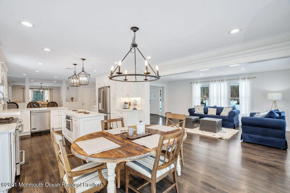 5 Cedar Drive Colts Neck, NJ 07722 - Photo 16 of 41 a view of a dining room with furniture window and wooden floor