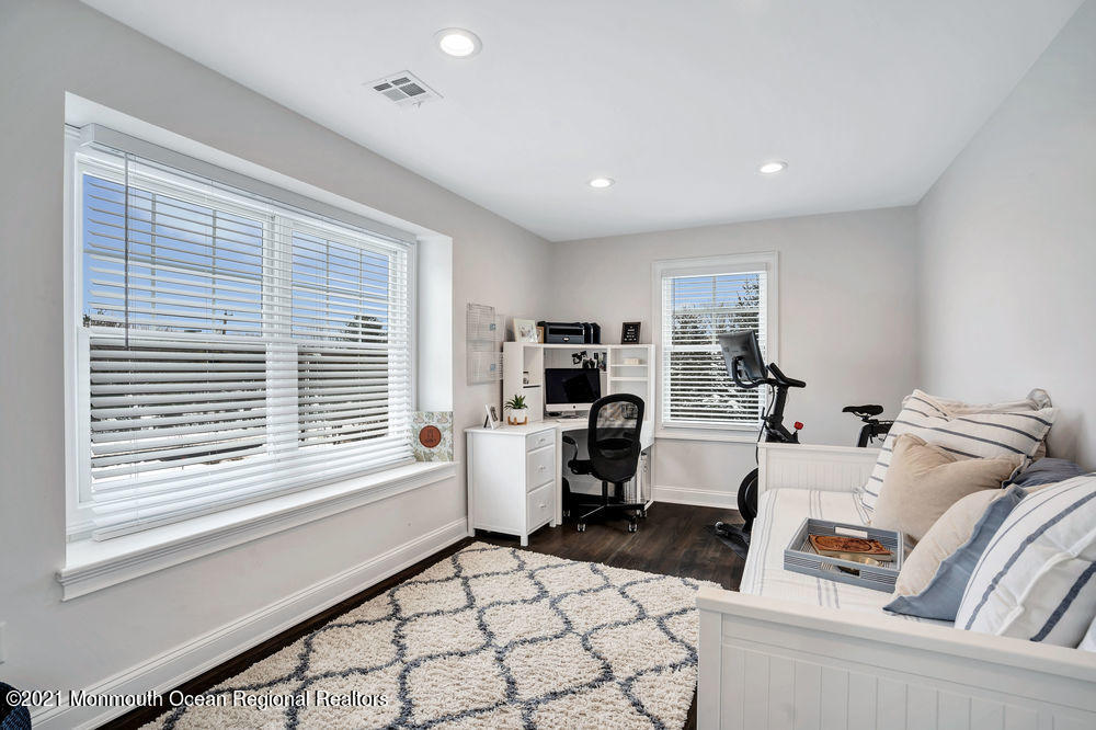 5 Cedar Drive Colts Neck, NJ 07722 - Photo 34 of 41 a living room with furniture and a window