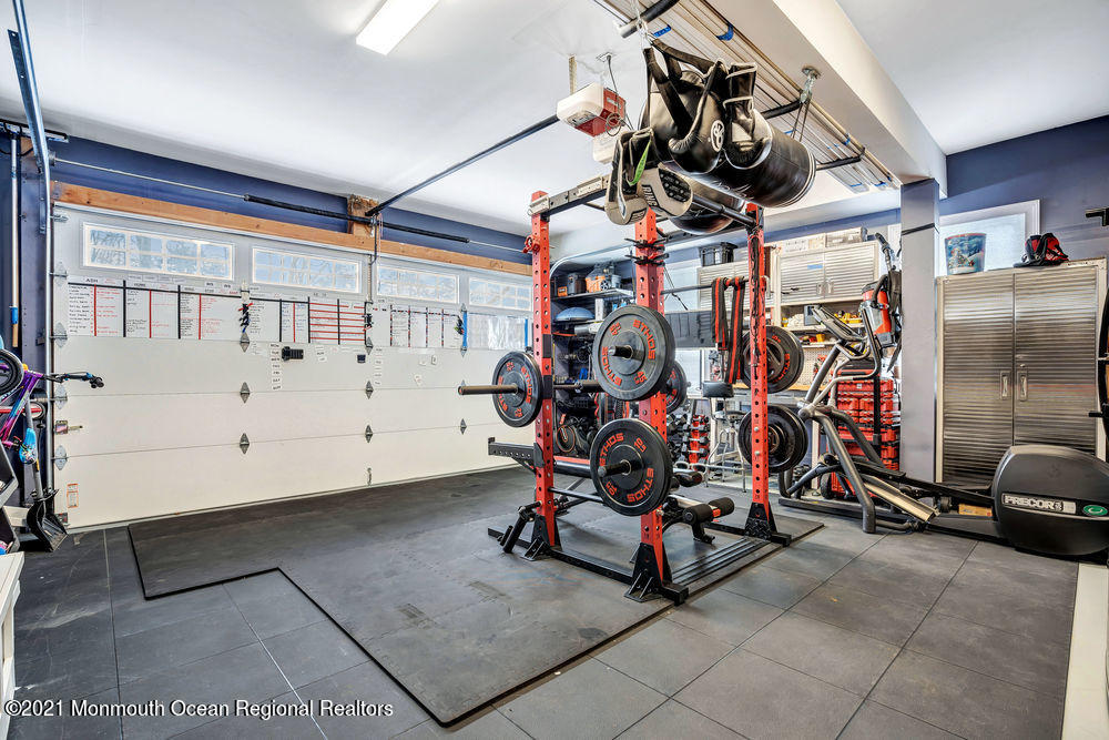 5 Cedar Drive Colts Neck, NJ 07722 - Photo 38 of 41 a view of a room with gym equipment