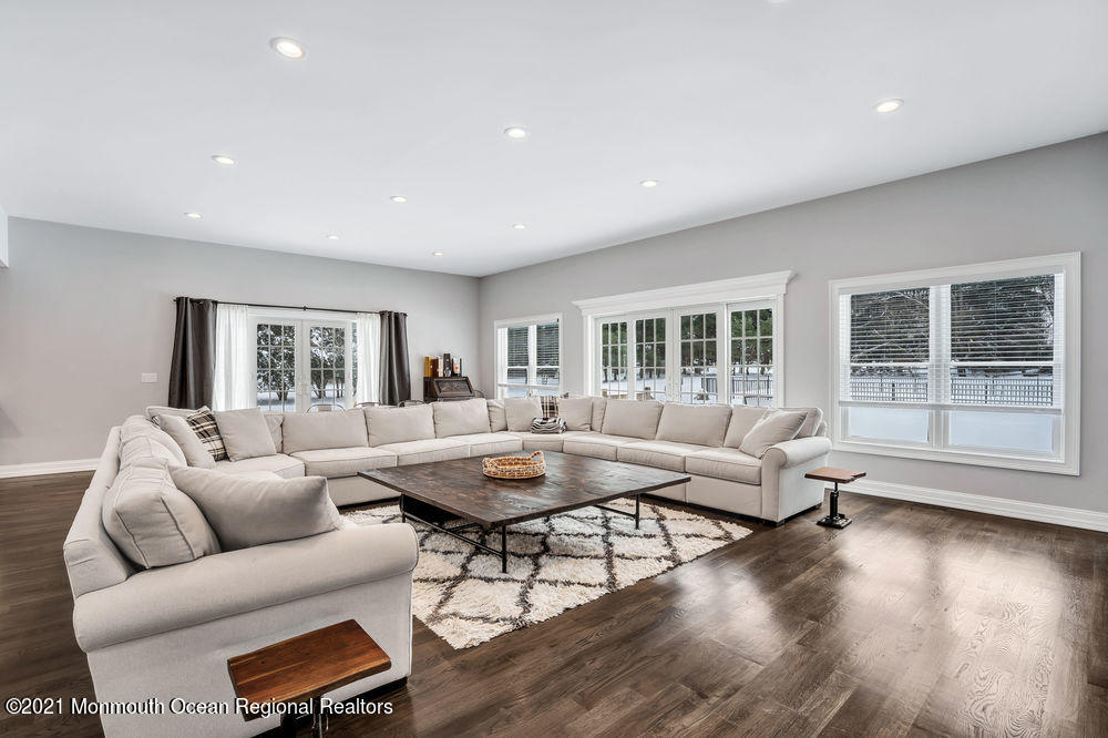 5 Cedar Drive Colts Neck, NJ 07722 - Photo 7 of 41 a living room with furniture and wooden floor