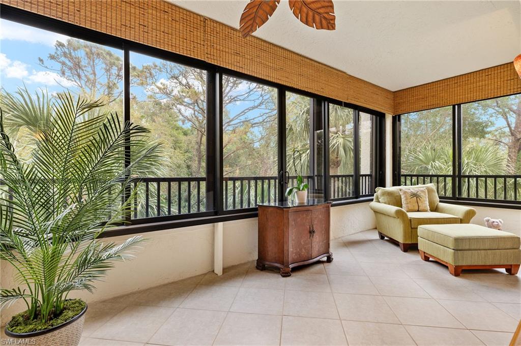 6500 Valen Way, Unit A203 Naples, FL 34108 - Photo 12 of 18 View of sunroom / solarium