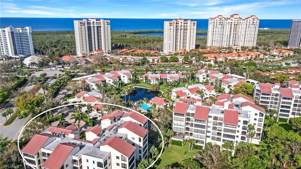 6500 Valen Way, Unit A203 Naples, FL 34108 - Photo 15 of 18 Birds eye view of property featuring a water view