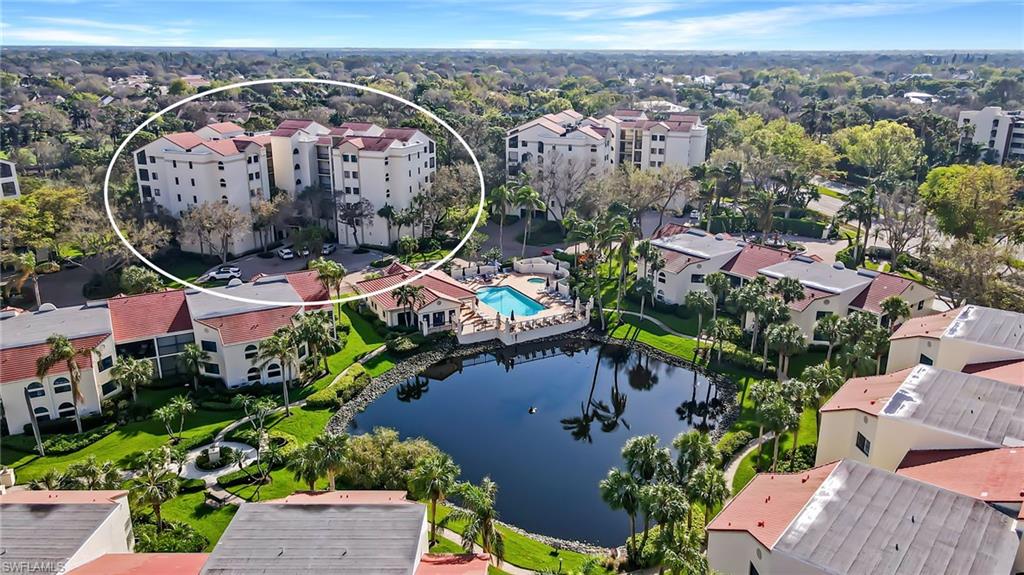 6500 Valen Way, Unit A203 Naples, FL 34108 - Photo 17 of 18 Drone / aerial view with a water view