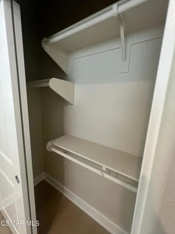 a view of a patio with swimming pool table and chairs