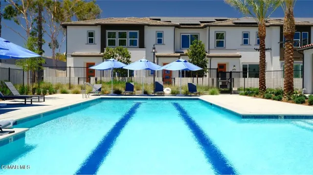 a view of a chairs and tables in patio
