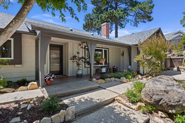 a front view of a house with patio