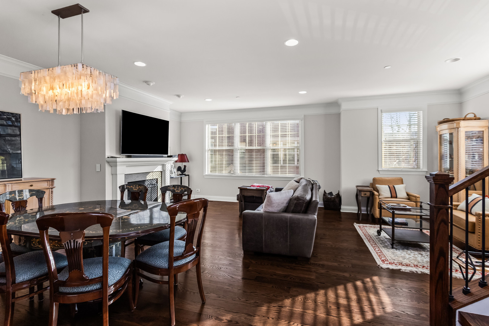 311 South NW Highway, Unit 1 Park Ridge, IL 60068 - Photo 21 of 30 a living room with furniture a flat screen tv and a chandelier