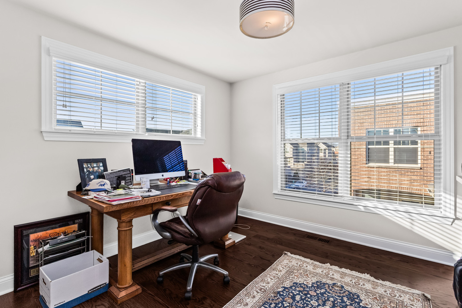 311 South NW Highway, Unit 1 Park Ridge, IL 60068 - Photo 22 of 30 a view of a workspace with furniture and a window