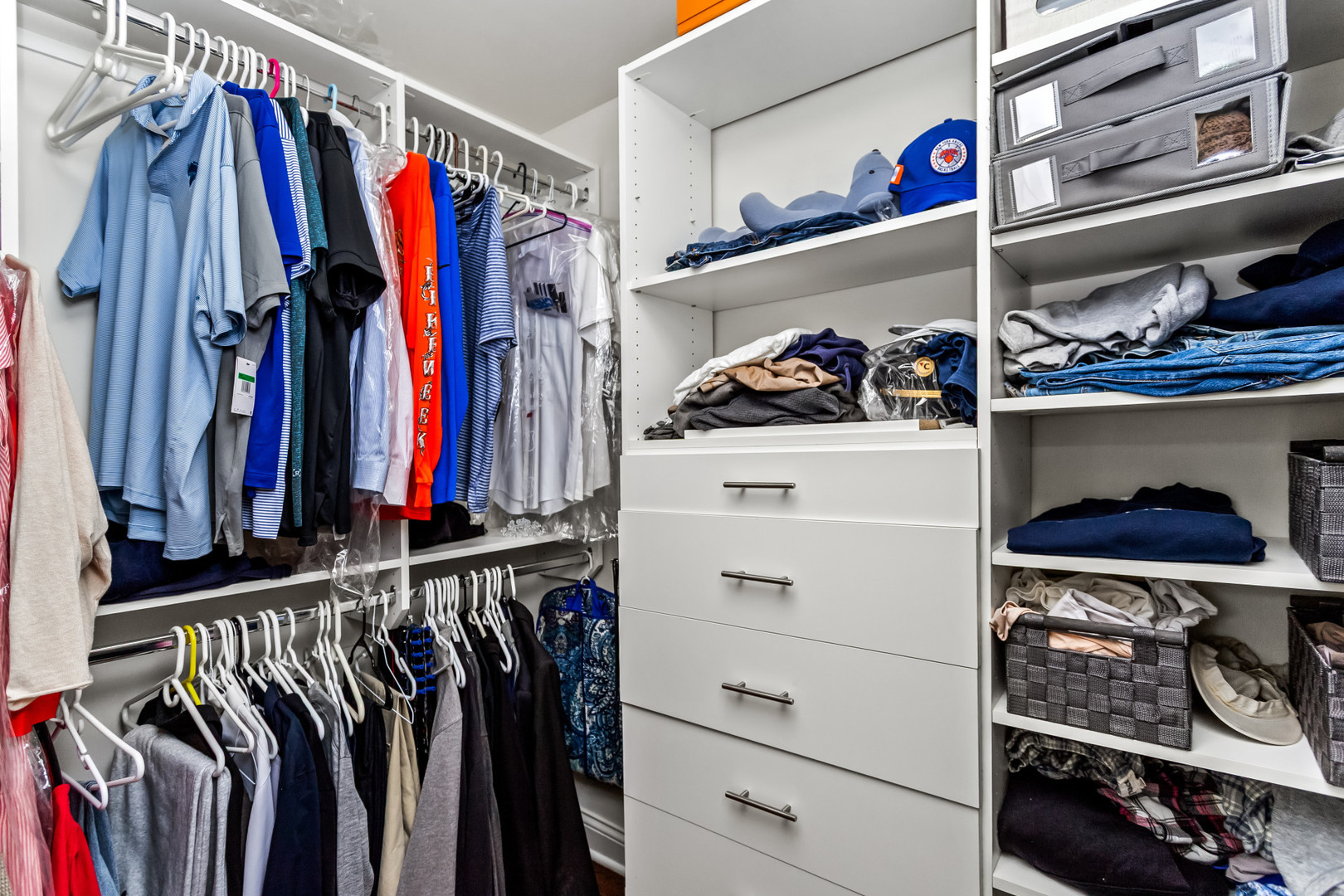 311 South NW Highway, Unit 1 Park Ridge, IL 60068 - Photo 23 of 30 a view of walk in closet with clothes and shoes
