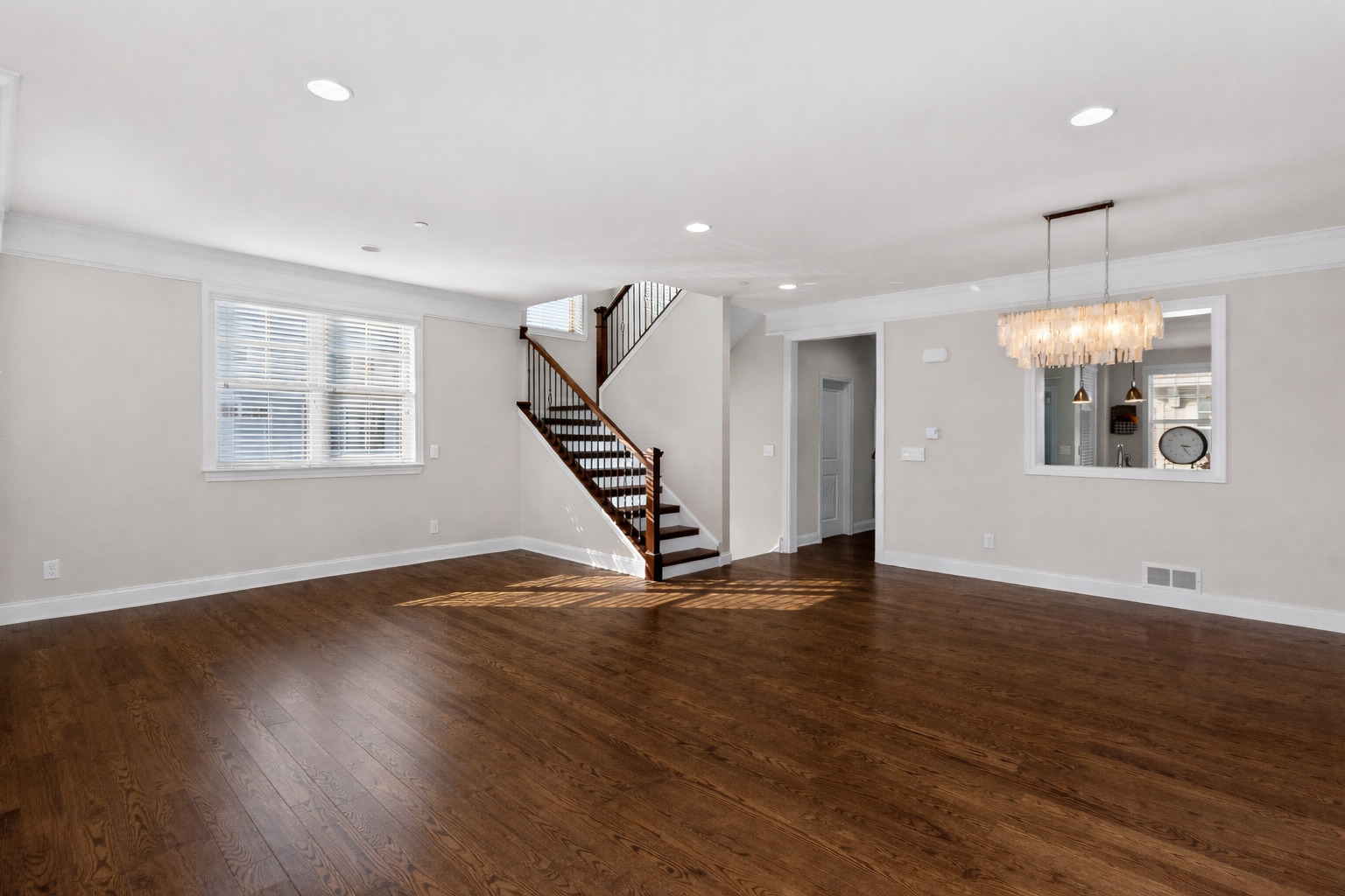 311 South NW Highway, Unit 1 Park Ridge, IL 60068 - Photo 8 of 30 a view of an empty room with wooden floor and a window