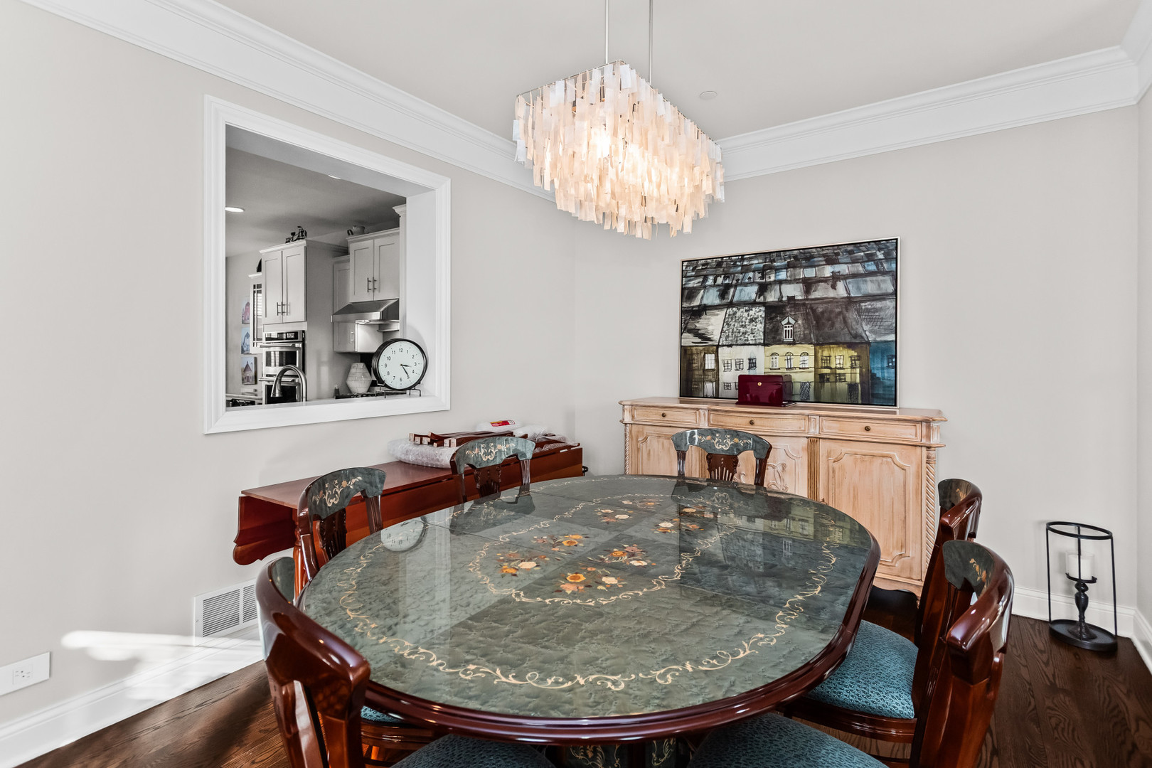311 South NW Highway, Unit 1 Park Ridge, IL 60068 - Photo 10 of 30 a view of a dining room with furniture and chandelier