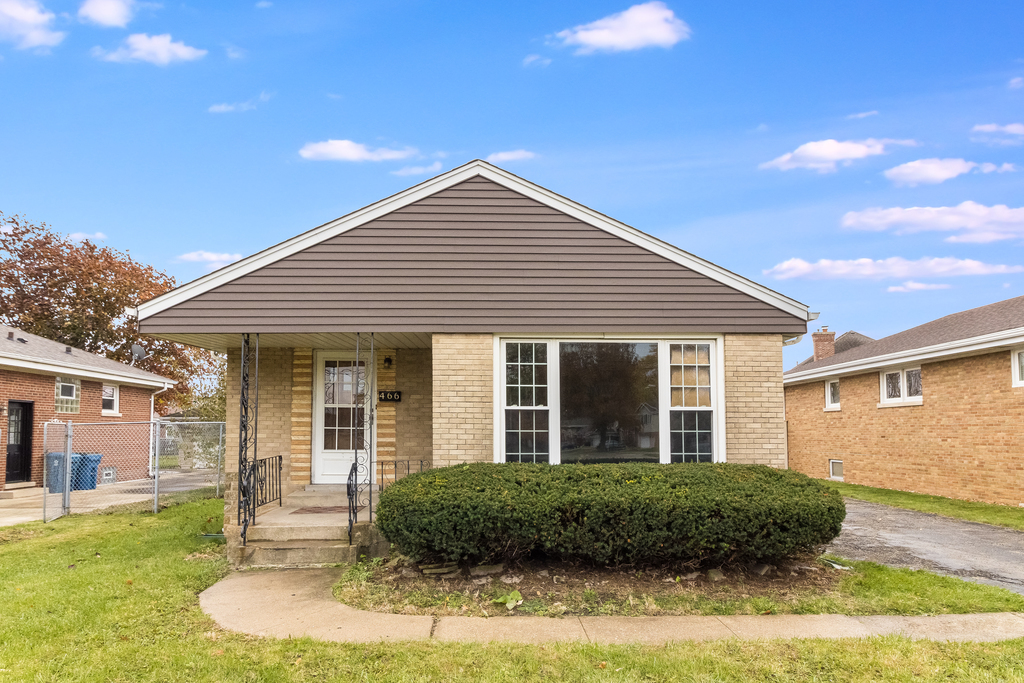 466 East Butterfield Road Elmhurst, IL 60126 - Photo 1 of 11 a view of a house with a yard
