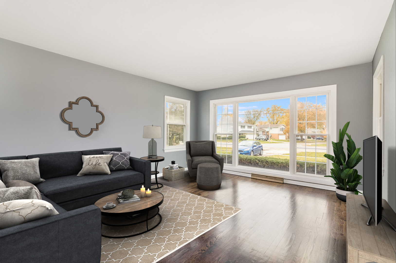 466 East Butterfield Road Elmhurst, IL 60126 - Photo 2 of 11 a living room with furniture and floor to ceiling window