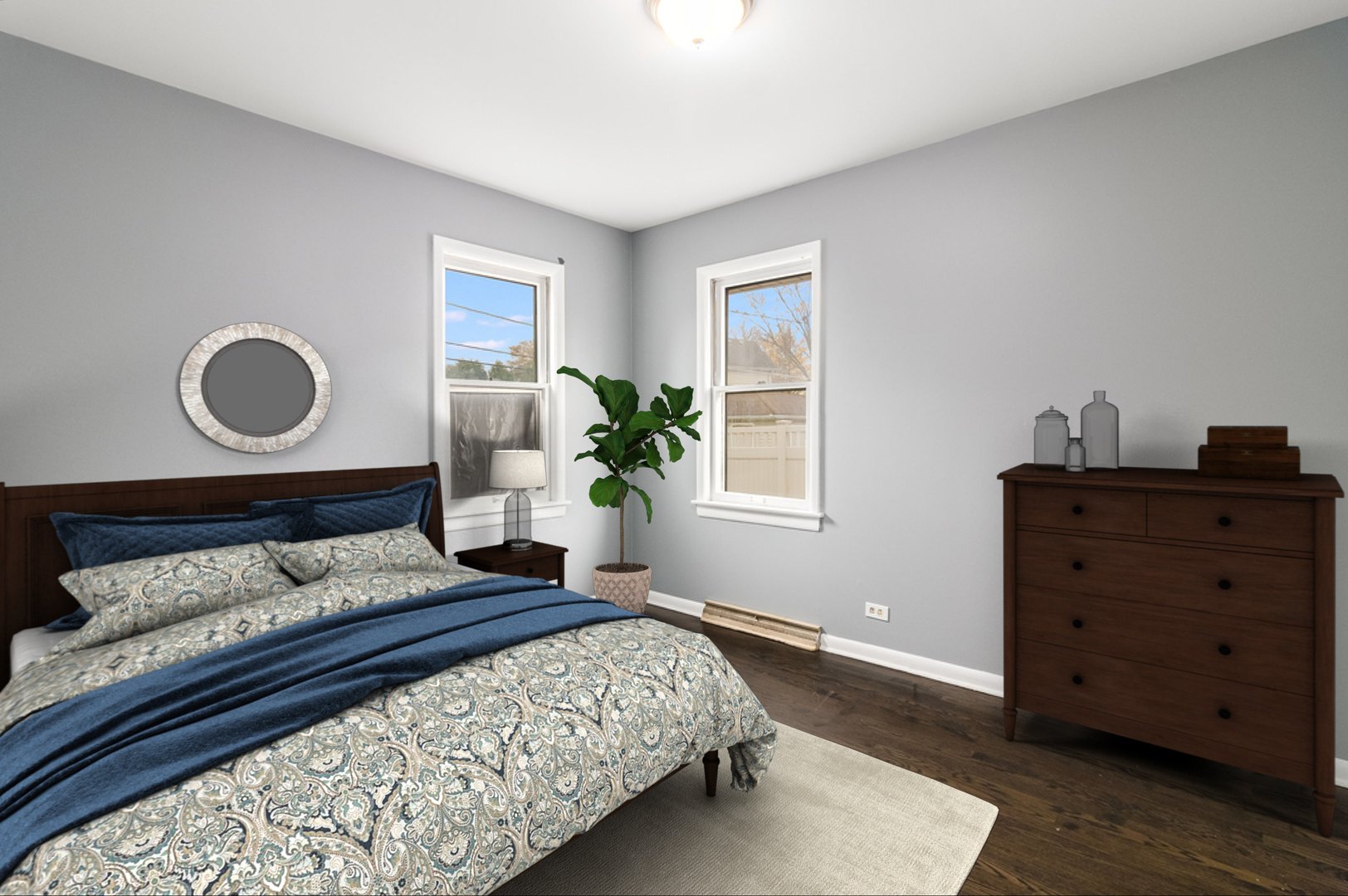 466 East Butterfield Road Elmhurst, IL 60126 - Photo 7 of 11 a bedroom with a bed and window