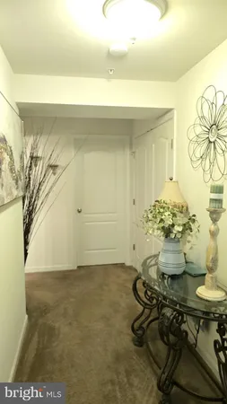 a table with a vase of flowers on it