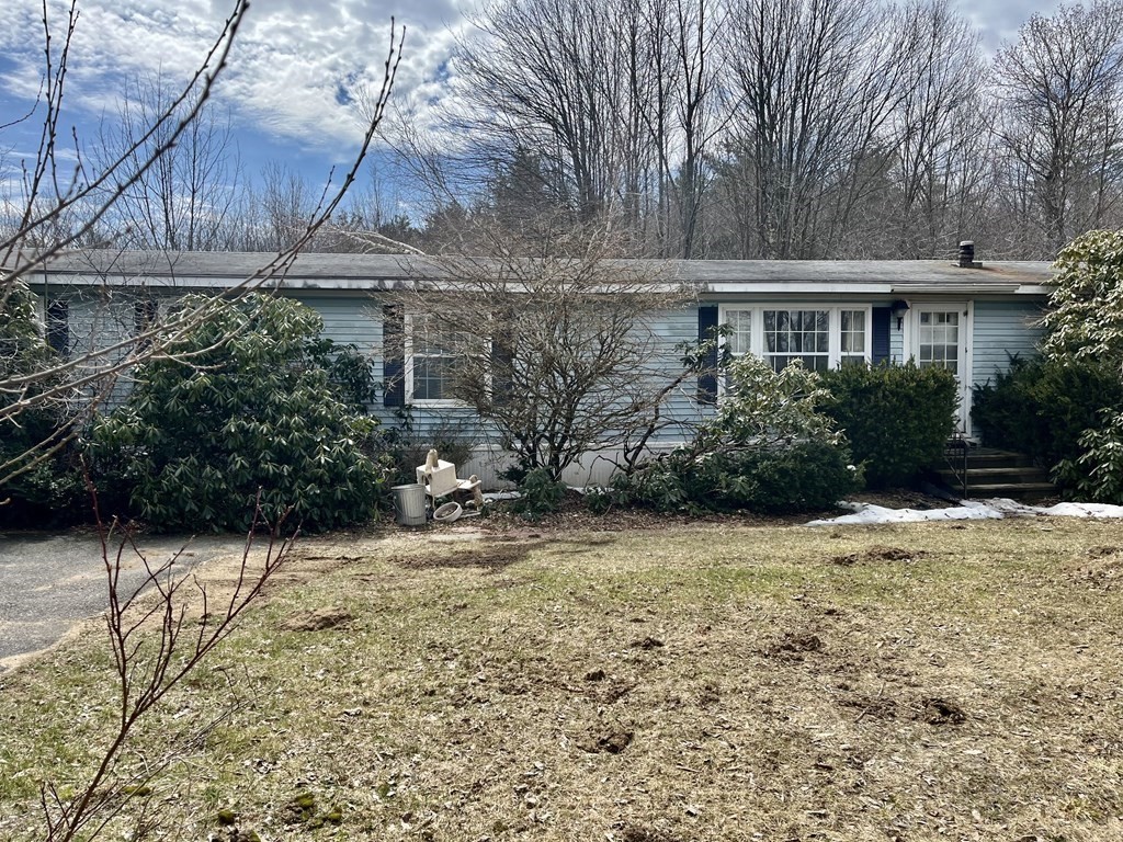 390 Patriots Road Templeton, MA 01468 - Photo 1 of 21 a view of a house with a yard