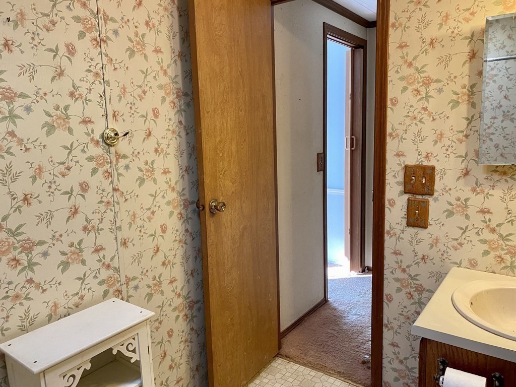 390 Patriots Road Templeton, MA 01468 - Photo 13 of 21 a bathroom with a sink and a mirror