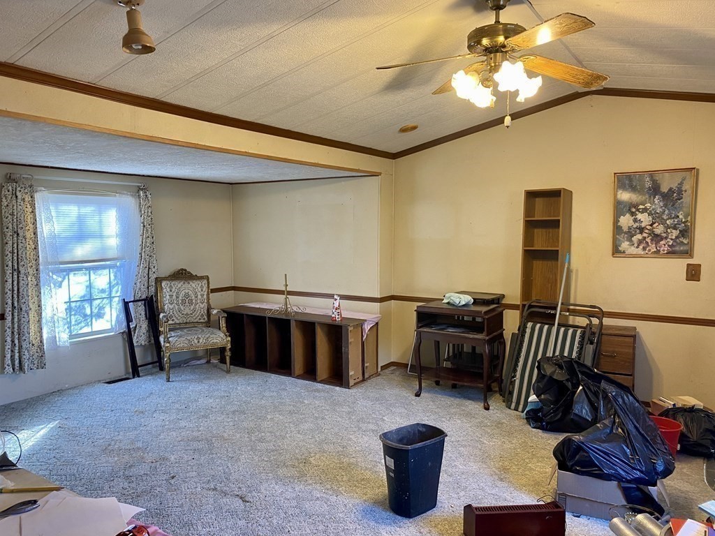 390 Patriots Road Templeton, MA 01468 - Photo 8 of 21 a living room with furniture and a window