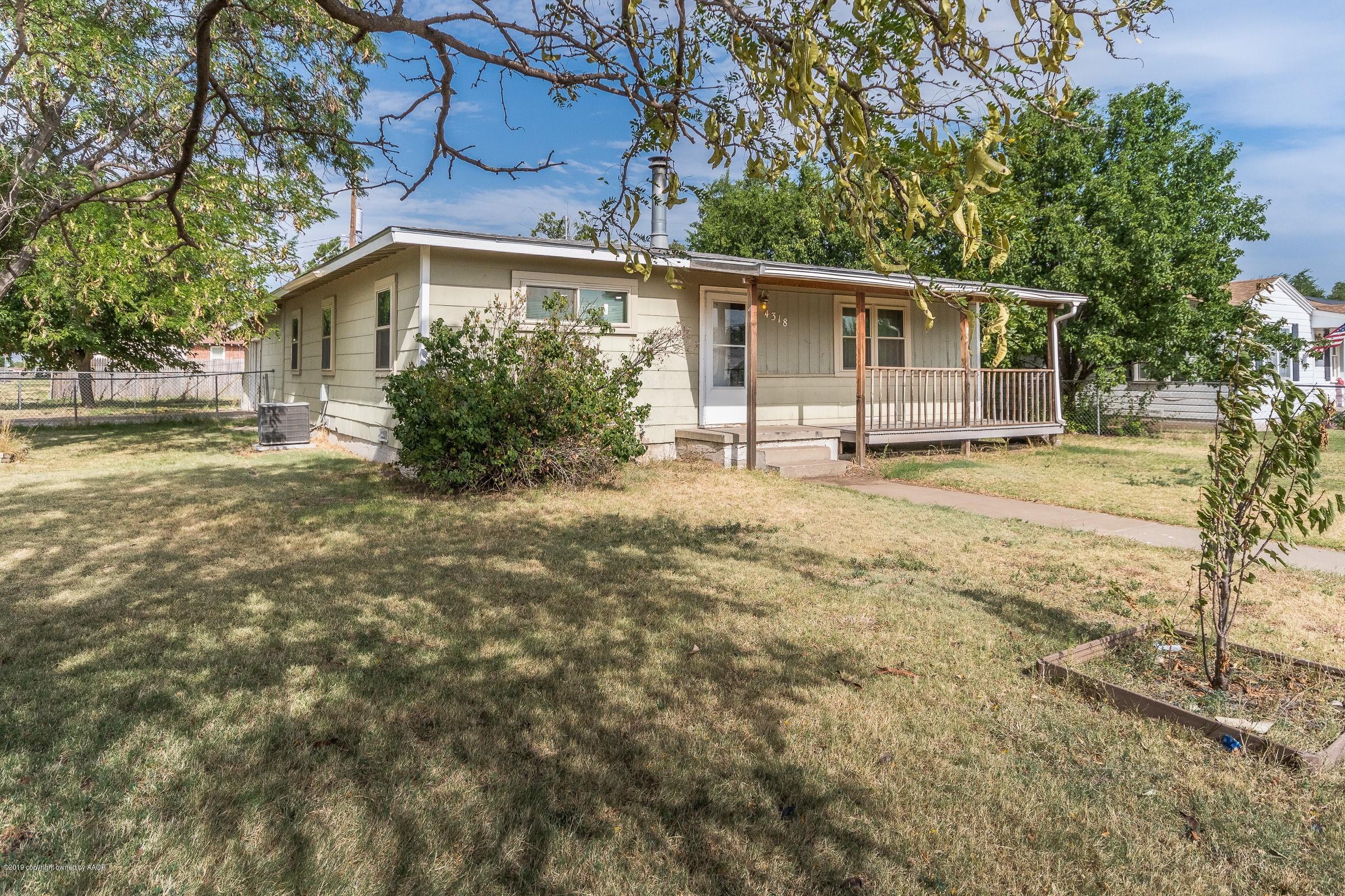 4318 Cline Road Amarillo, TX 79110 - Photo 1 of 21 a view of a house with a yard
