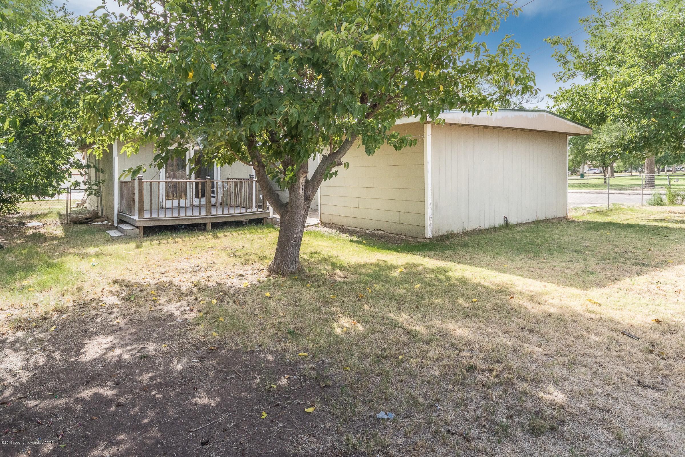 4318 Cline Road Amarillo, TX 79110 - Photo 19 of 21 a house with trees in front of it