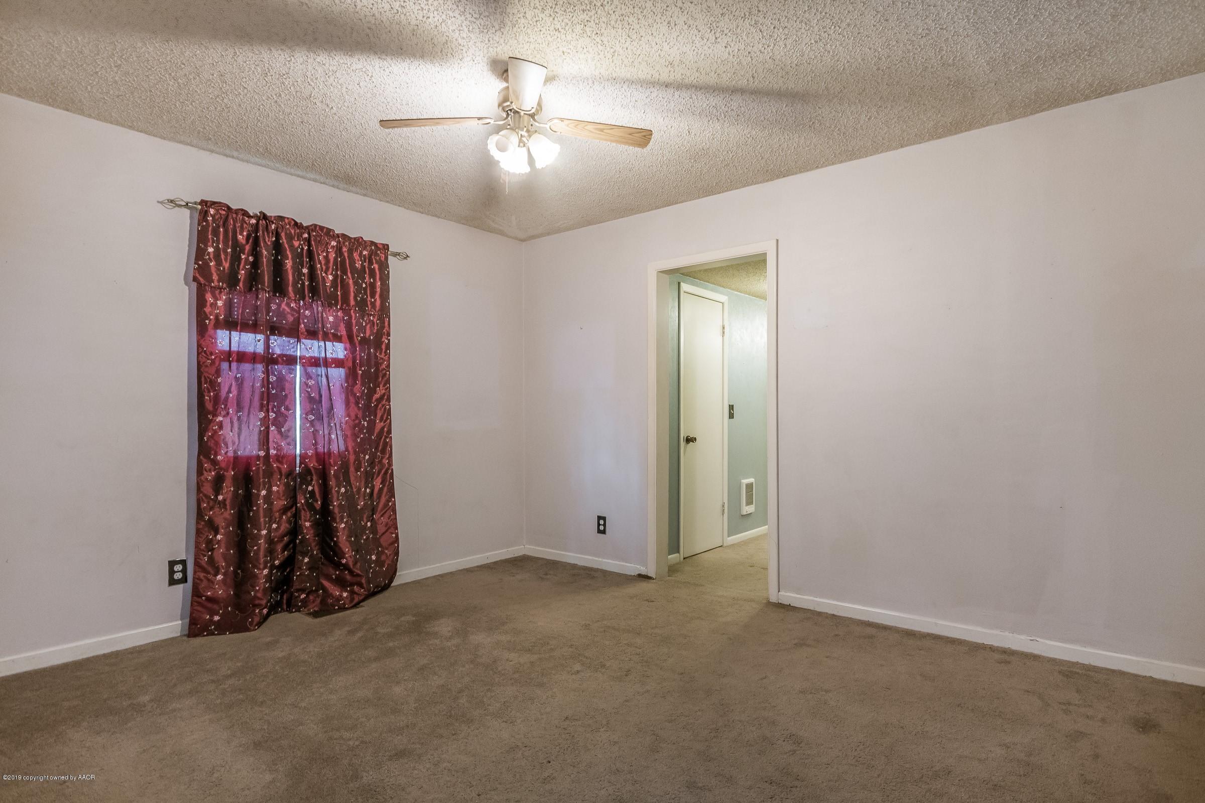 4318 Cline Road Amarillo, TX 79110 - Photo 9 of 21 a view of an empty room with closet