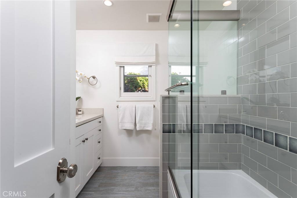 865 Fen Way Laguna Beach, CA 92651 - Photo 14 of 27 a bathroom with a bathtub and shower