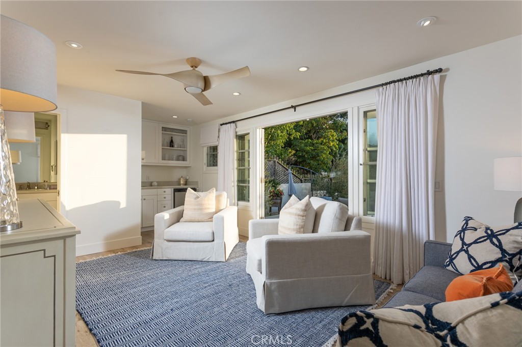 865 Fen Way Laguna Beach, CA 92651 - Photo 16 of 27 a living room with furniture and a large window