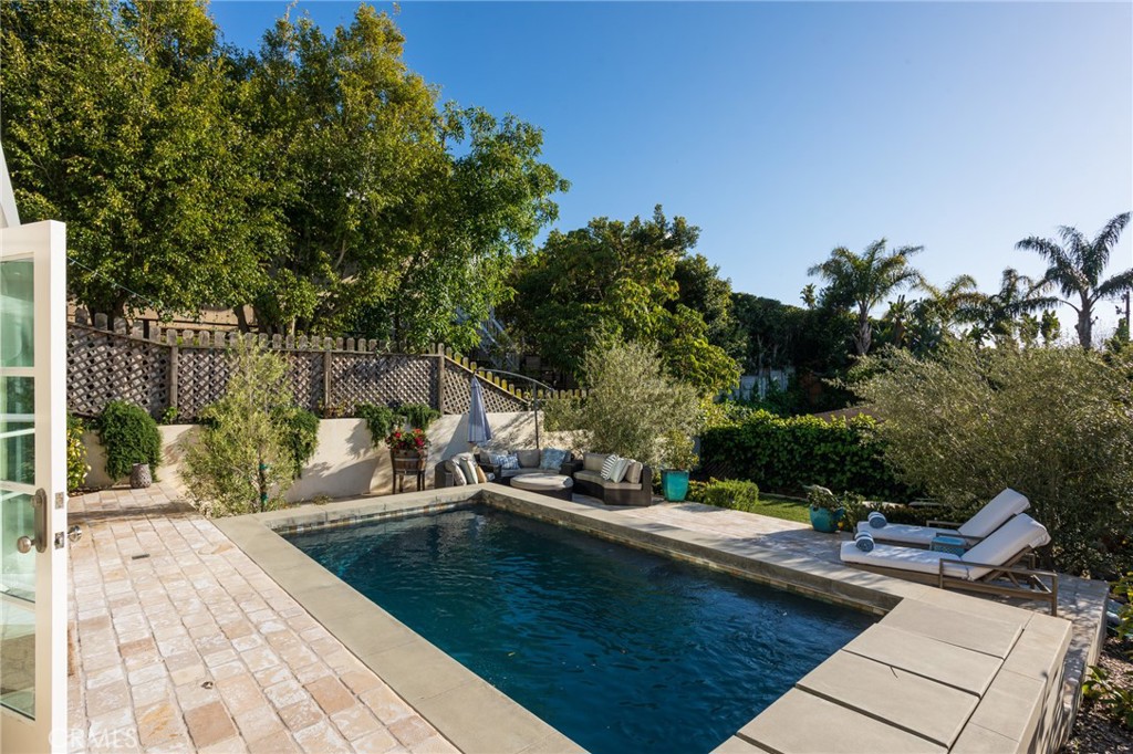865 Fen Way Laguna Beach, CA 92651 - Photo 22 of 27 a view of a swimming pool with a patio
