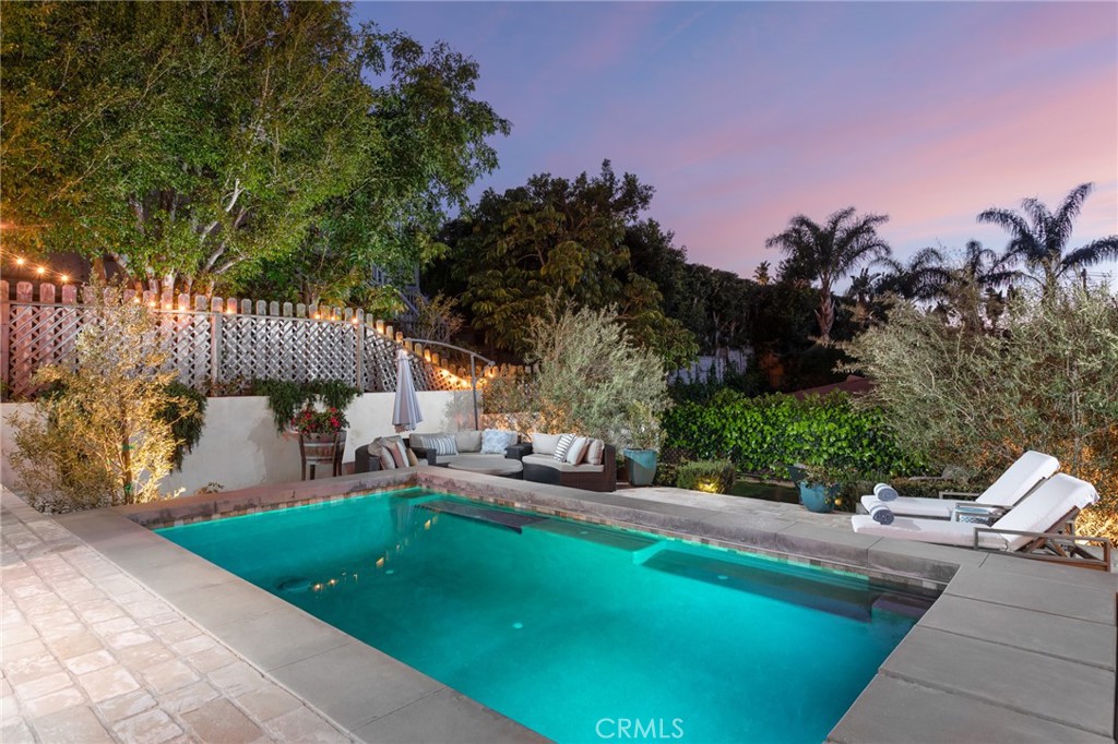 865 Fen Way Laguna Beach, CA 92651 - Photo 3 of 27 a view of a patio with couches table and chairs and potted plants