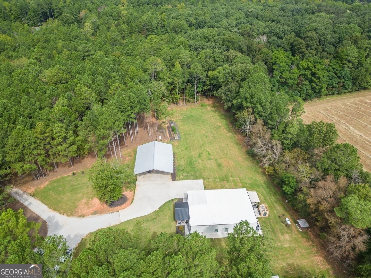 3060 Eatonton Road Madison, GA 30650 - Photo 61 of 65 an aerial view of residential house with outdoor space