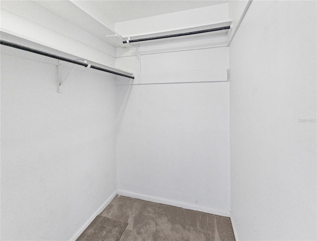 680 Midway Drive, Unit A Ocala, FL 34472 - Photo 14 of 39 a view of a room with shelf