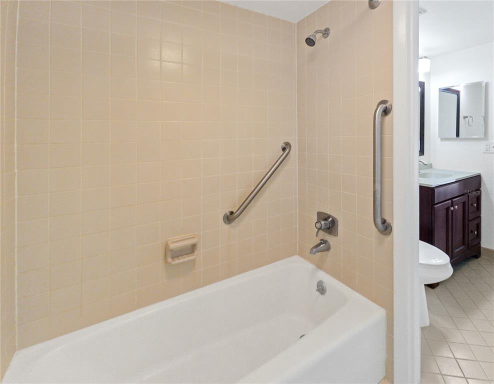 680 Midway Drive, Unit A Ocala, FL 34472 - Photo 18 of 39 a bathroom with a bathtub and a shower